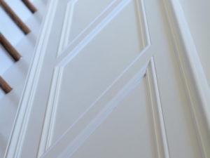 Hallway panelling beside stairs